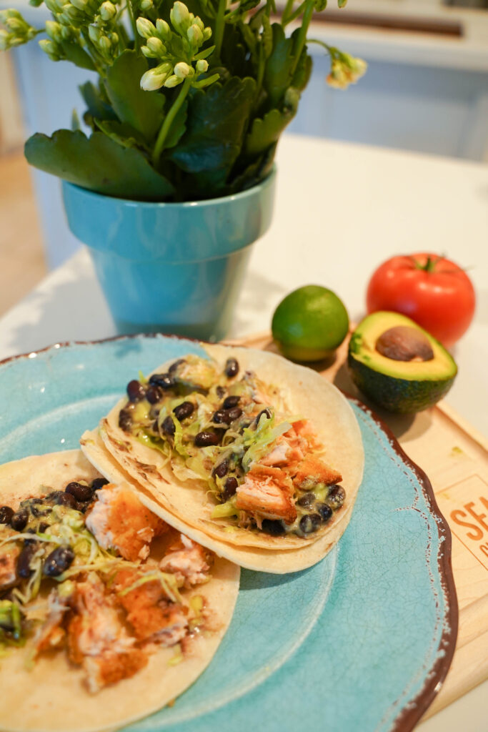 salmon fish tacos with guacamole salsa | Adored by Alex