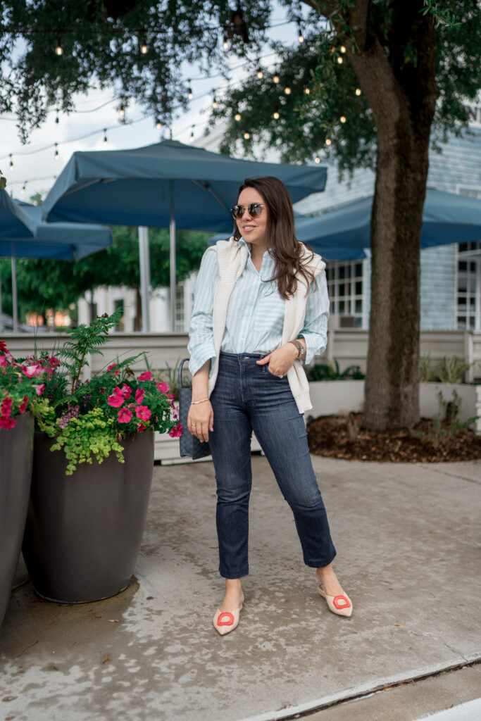 The classic button-down shirt by AYR, the Deep End shirt in stripe is a closet staple paired with Mother Denim and raffia slide mules, plus Krewe aviator sunglasses | Adored by Alex