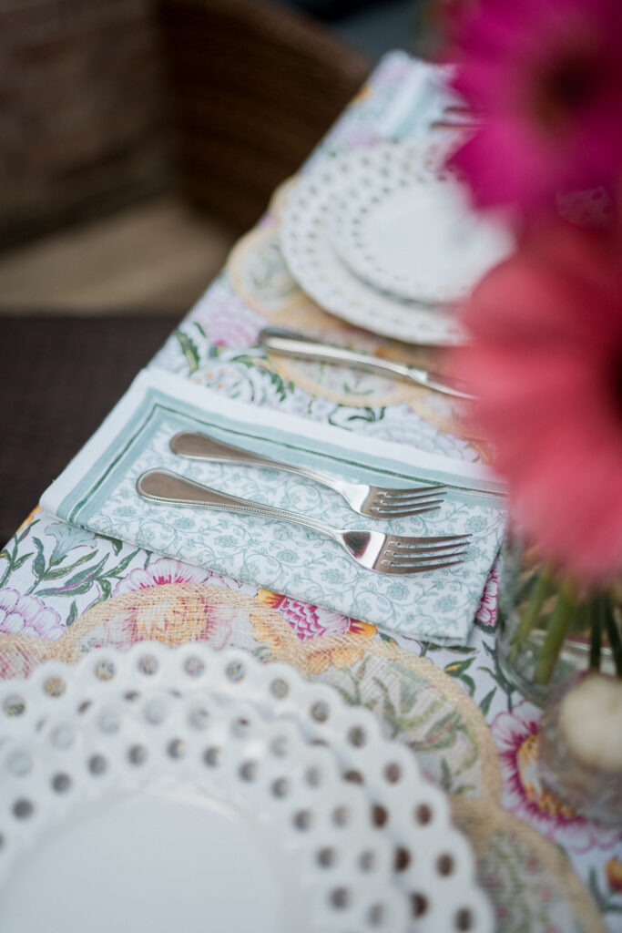 Mixing floral patterns for napkins and table cloth when setting a table setting and table decor | Adored by Alex 